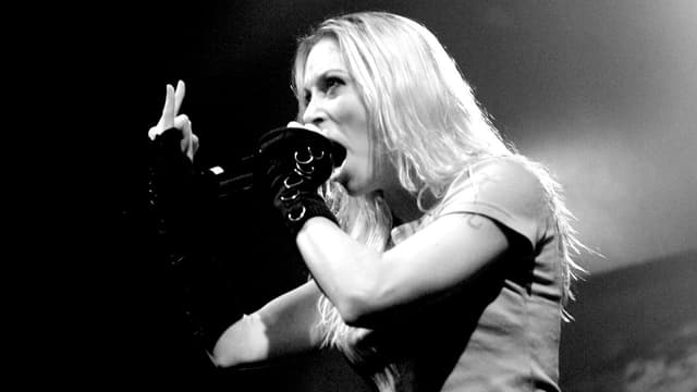 "She’d be talking about a song with a really good guitar solo and demand we change it, make it heavier." The trailblazing metal singer who saved an influential band's career and inspired a generation of women in the process