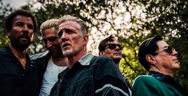 Queens of the Stone Age debut new song "Where the Goth Girls At?" and music video