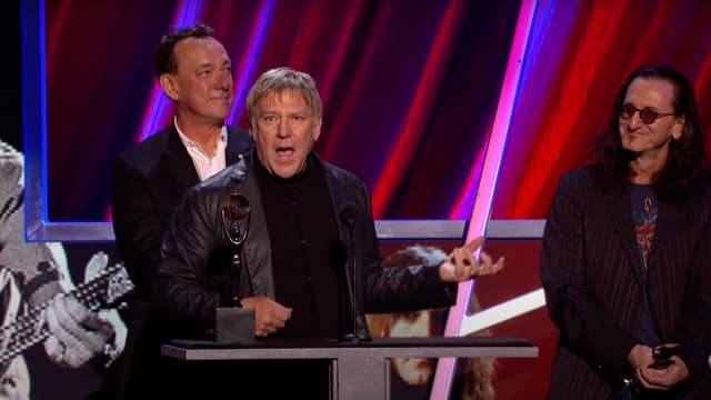Remembering that time Rush's Alex Lifeson trolled the Rock And Roll Hall Of Fame with the most ridiculous awards speech ever