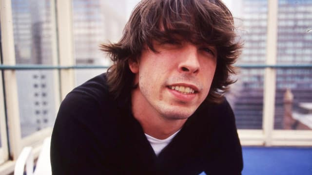 "His dad would come home from his night job and he had to sleep in the daytime. When he and his brother were too loud, his dad would give them military punishment." What exactly is Foo Fighters frontman Dave Grohl whispering on Everlong?