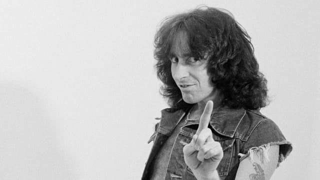 "When I came back, my desk was covered in flowers. That's who Bon Scott was." The story of a friendship with a golden-hearted charmer