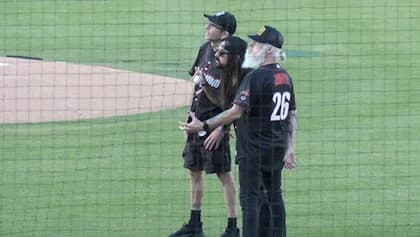 Watch: LAMB OF GOD Tosses Out Ceremonial First Pitch, Plays National Anthem At CarMax Park In Band's Hometown
